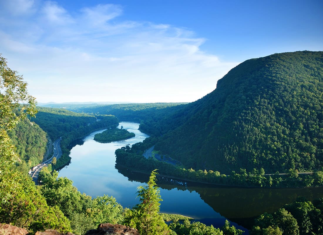 Contact - Large River Winding Around a Mountain Range