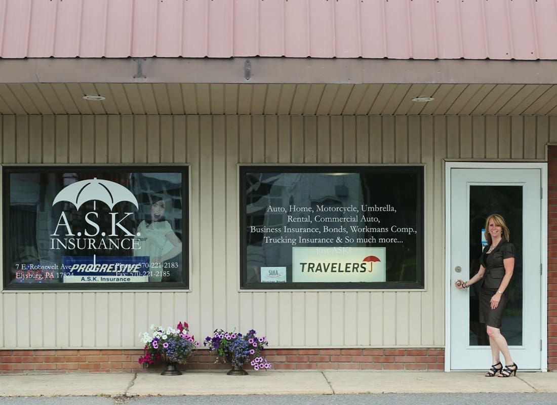 Elysburg, PA - Exterior View of the ASK Insurance Office With the Owner Standing in Front