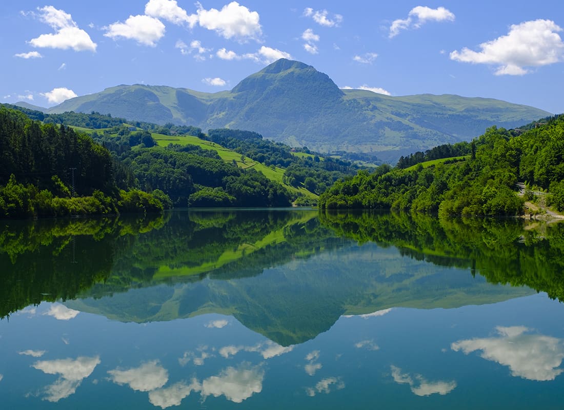 Insurance Solutions - Reflection of a Mountain Within a Calm Lake