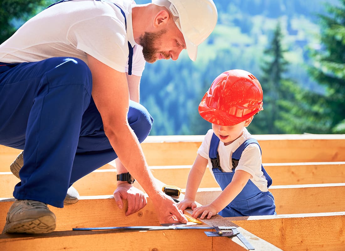Insurance by Industry - Construction and a Child Working Taking Measurements Together